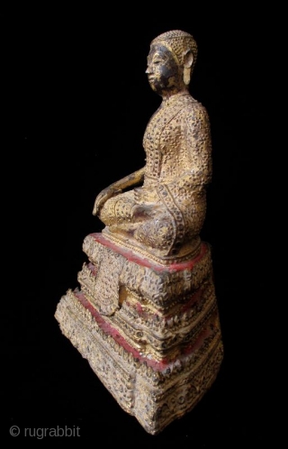 Antique Thai Seated Gilt Bronze Buddha

Gilt bronze Buddha seated with serene expression. Intricate metal granulation on drapery and throne. Details of red lacquer on tiered trapezoidal seat. Thailand. 

Early 19th century 

Dimensions:  ...