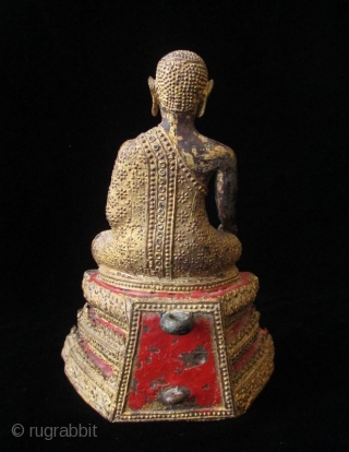 Antique Thai Seated Gilt Bronze Buddha

Gilt bronze Buddha seated with serene expression. Intricate metal granulation on drapery and throne. Details of red lacquer on tiered trapezoidal seat. Thailand. 

Early 19th century 

Dimensions:  ...