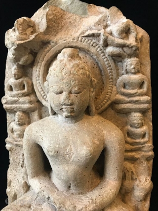 Antique Jain Sandstone Stele with a Jina

A rare Jain Indian sandstone Stele with a carved image of Buddha surrounded by his attendants from the Gujarat or Rajasthan regions. Seated figures of Jain  ...