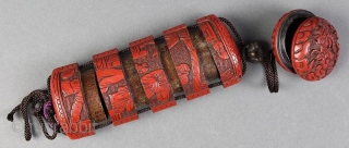 Antique Carved Cinnabar Lacquer Inro w/Manju

An exquisite hand-crafted Japanese cinnabar lacquered Inro with five compartments and Manju. It has a meticulously carved scene with 2 scholars or sages on one side and  ...