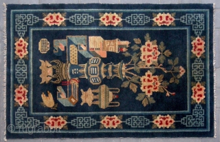 No.R151 * Chinese Antique Rug . Age: 19th Century. Size: 100x156cm(39"x61"). Origin: Baotou-Suiyuan Shape: Rectangle. Background Color: Blues. The carpet shows the symbols of the Four Accomplishments:The lute, the chessboard, the paintings  ...