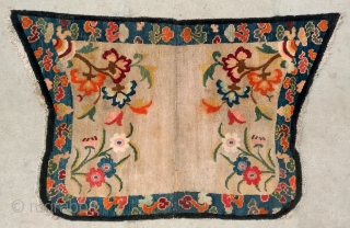 No.DX089 * Chinese Tibetan Lady Saddle Rugs.Age: Early-20th Century.Size: 70 x 110cm (2'3"x3'7").Origin: Tibet. Shape: Papilionaceous.Background Color: Off-whites,lvory. Flower design with stylized floating cloud motifs.        