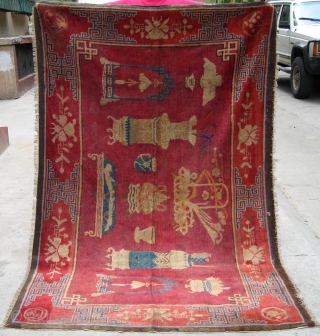 No.R022 * Chinese Antique "Vase Design" Rug,Age:19th Century.Size: 136x219cm(4'6"x7'2").Origin: Baotou-Suiyuan.Shape: Rectangle.Background Color: Reds.
This interesting carpet depicts the symbols of Hundred of Antiques: the incense burner, the teacup, the Ruyi (meaning wish come  ...