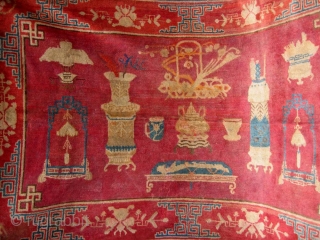 No.R022 * Chinese Antique "Vase Design" Rug,Age:19th Century.Size: 136x219cm(4'6"x7'2").Origin: Baotou-Suiyuan.Shape: Rectangle.Background Color: Reds.
This interesting carpet depicts the symbols of Hundred of Antiques: the incense burner, the teacup, the Ruyi (meaning wish come  ...