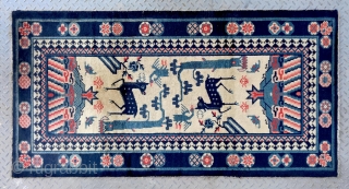 No.Lu12 * Chinese Antique "Crane + Deer" Rug , Age: 19th Century. Size: 87x169cm(2'10" X 5'7").Origin: Baotou-Suiyuan.Shape: Rectangle. Background Color: Off-whites,lvory.
A deer by a tree with a crane and bats at the  ...