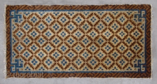 No.R040 * Chinese Antique Rug .Size: 51x100cm(1'9"x3'3").Origin: Baotou. Age: Early-19th Century.Shape: Rectangle.Background Color: Browns .The field is composed of a very nice flower lattice pattern. The rug was woven in classic brown  ...