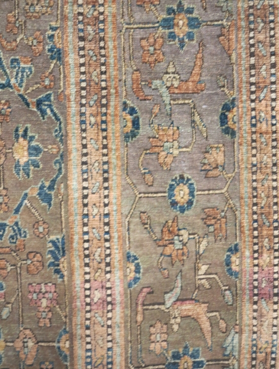 A silk and metal-thread Khotan carpet, lot 124